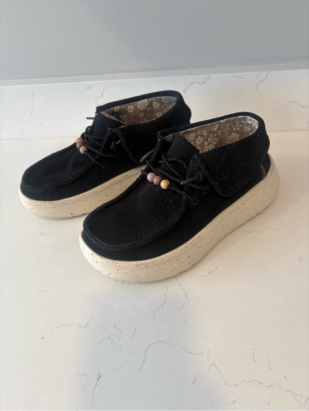 Woman’s Hey Dude moccasin ankle sneaker
